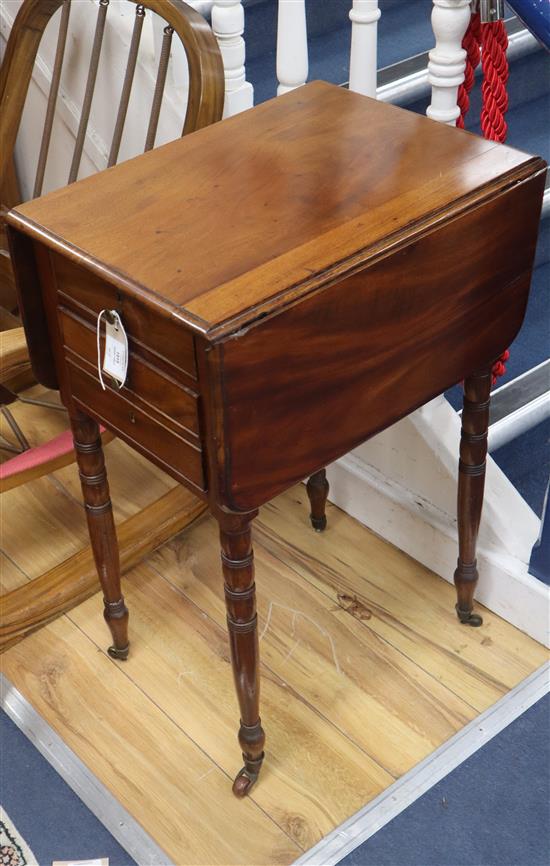 A Regency mahogany drop flap work table, fitted two small drawers, on ring turned supports H.73cm